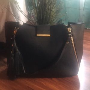 Steve Madden bag with tassels and shoulder strap